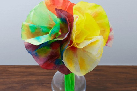 Large paper flowers made from coffee filters.