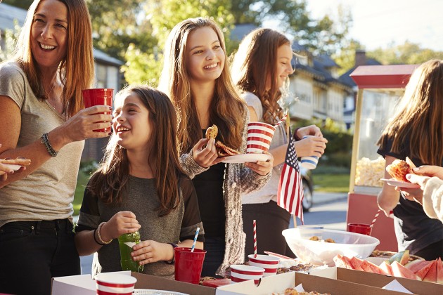 A family at a Fourth of July cookout.