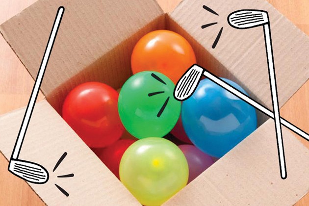 A box full of inflated balloons for playing a golf game.
