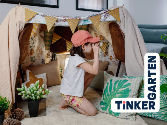 Child playing in indoor tent