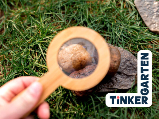 Magnifying glass with rock