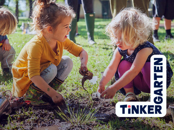 Child playing and learning with mud