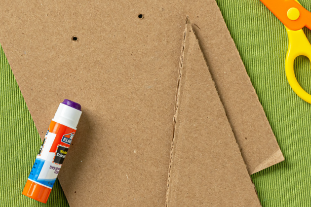 glue stick and cardboard stand for cardboard flower vase kids craft step 3