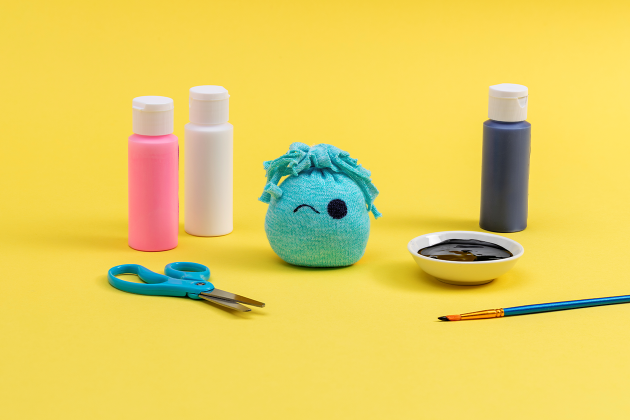 decorated squish buddies craft using paint and scissors