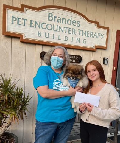 Ariela Leff donates money from bracelet sales to support a therapy pet program.