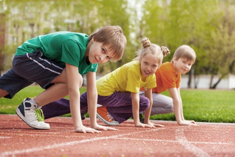 Kids at the starting line, ready for a race.