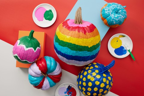 Striped, zigzag and polka dot painted pumpkins.