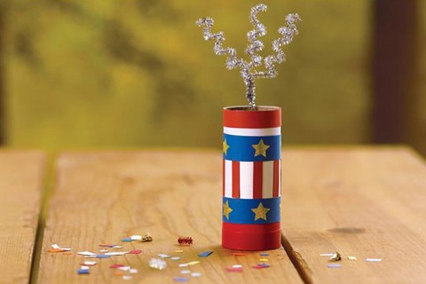 A confetti popper made from a decorated cardboard tube.