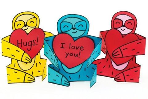 Print, cut and give these cartoon sloths that hold a heart message.