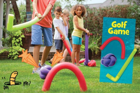 Kids playing croquet with ball, wickets and mallets made from pool noodles.