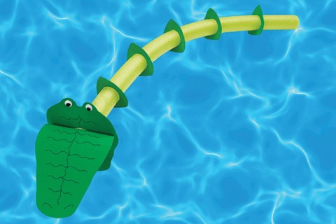 Shapes cut out of craft foam and attached to a pool noodle to look like an alligator.