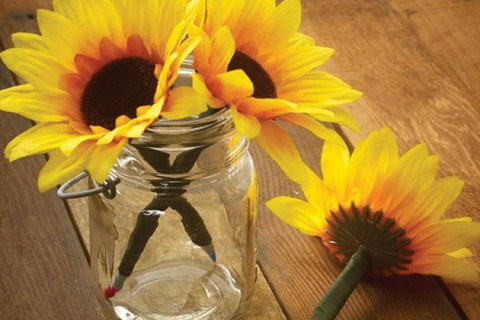 Ballpoint pens decorated to look like sunflowers.