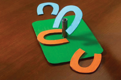 Do-it-yourself horseshoe game made from cardboard.
