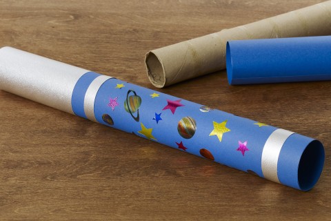 A play telescope made from decorated cardboard tubes.