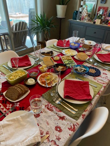  Christmas table set with foods in a traditional Danish style.